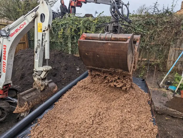 groundworker with laser level